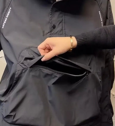 Anorak – Leichter Kapuzen-Windbreaker mit halbem Reißverschluss und Tasche